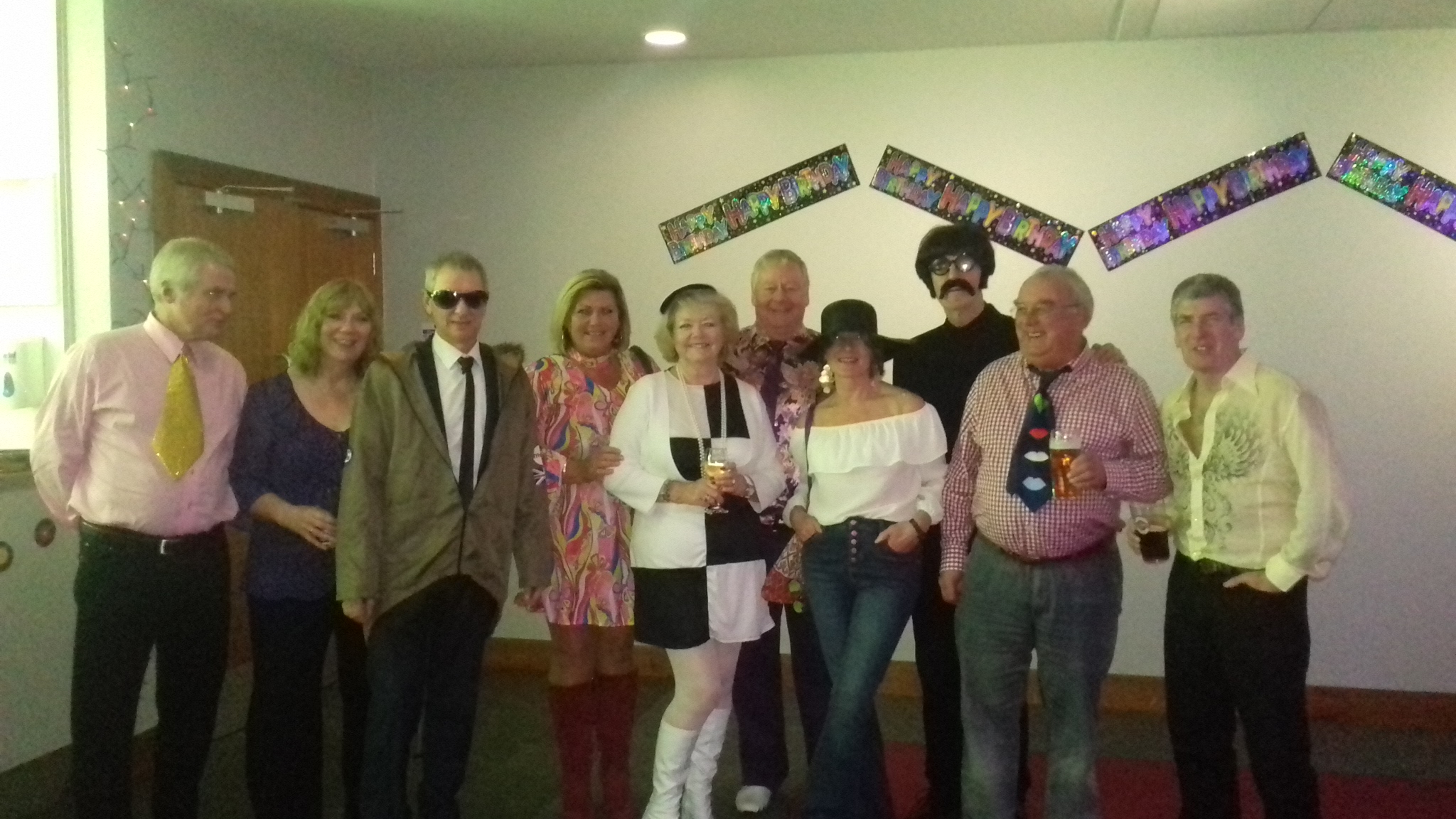 2017 Colin's 60th - everyone dressed in 60's gear...